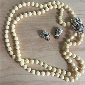 Signed SELRO SELINI Cream Noh mask necklace and earrings set